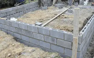 Professionals building a foundation with blocks in Philadelphia, PA