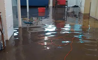 Basement with boiler, cabinets and washing machine completely flooded in Philadelphia, PA