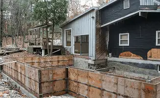 Prepared site with foundation forms for home remodeling and addition project in Philadelphia, PA